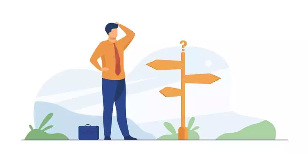 Personne qui se gratte la tête devant un poteau donnant différentes directions