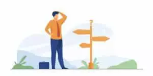 Personne qui se gratte la tête devant un poteau donnant différentes directions